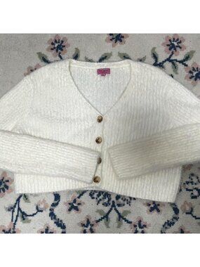 White button up cropped fuzzy sweater. Size small....